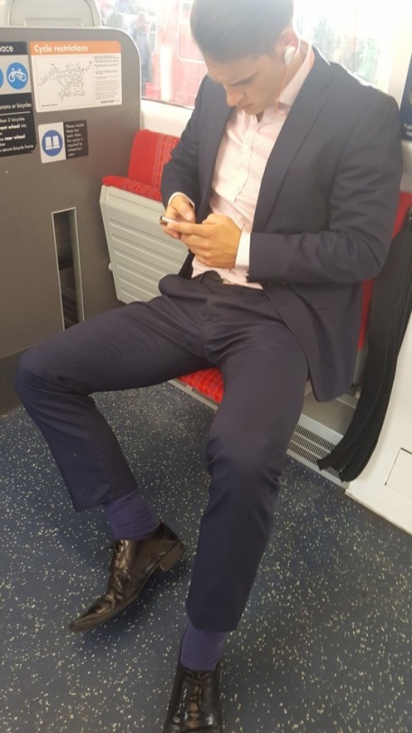 random-anonymous-tube-passenger-sexy-young-train-guy-suited-gentleman-hunk-texting