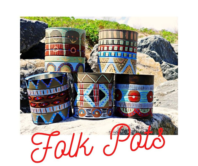 DIY Folk Pots made from repurposed coffee tins.