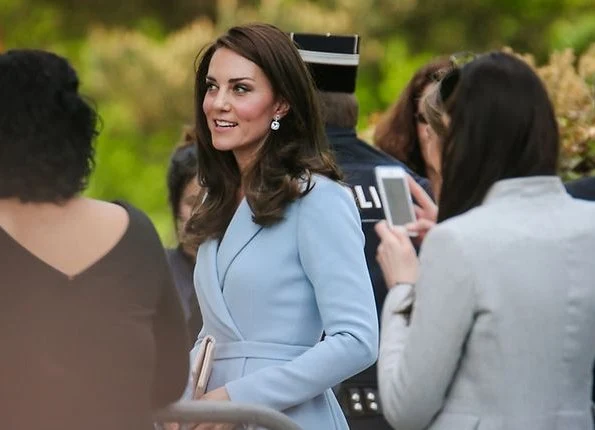 Kate Middleton wore a sky blue bespoke double wool crepe coat by Emilia Wickstead. Hereditary Grand Duchess Stéphanie wore Valentino ruffled dress
