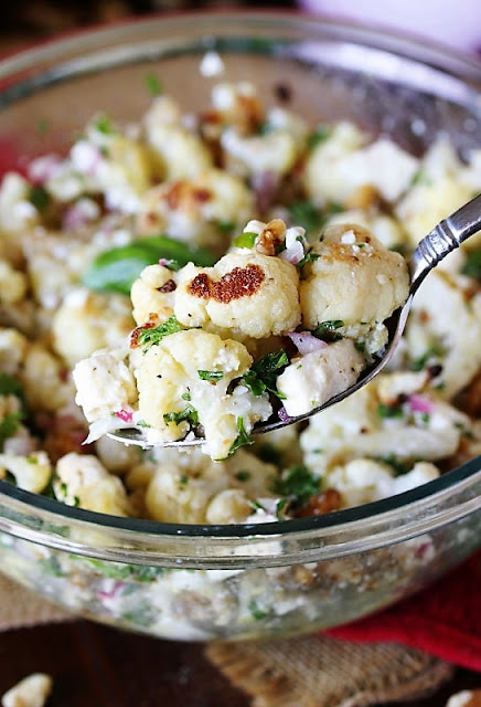 Serving Spoon of Roasted Cauliflower Salad Image