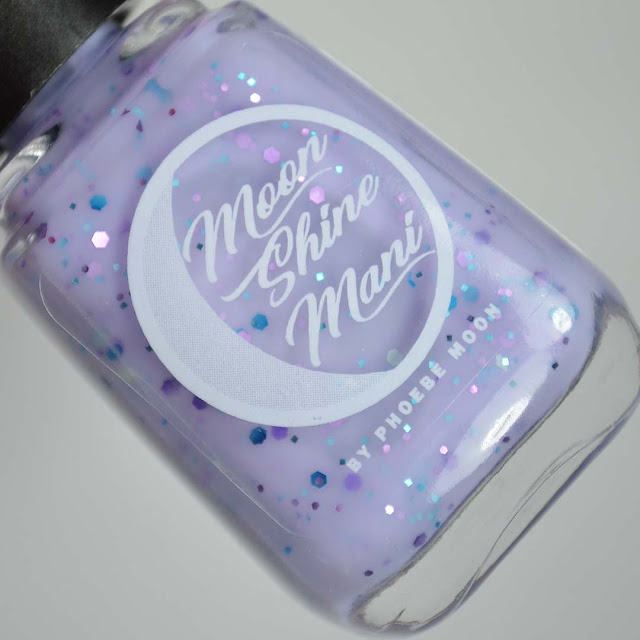 purple glitter nail polish in a bottle