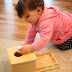 Developing Object Permanence Skills in the Montessori Environment