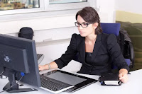 Woman working at her desk