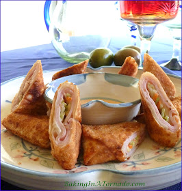Chipotle Cordon Bleu Egg Rolls, a cordon bleu flavors married with a spicy slaw in a pan fried egg roll. Serve for lunch, dinner or an appetizer | Recipe developed by www.BakingInATornado.com | #recipe #lunch #appetizer