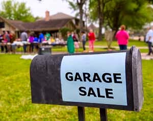 Garage Sale sign advertising a yard sale