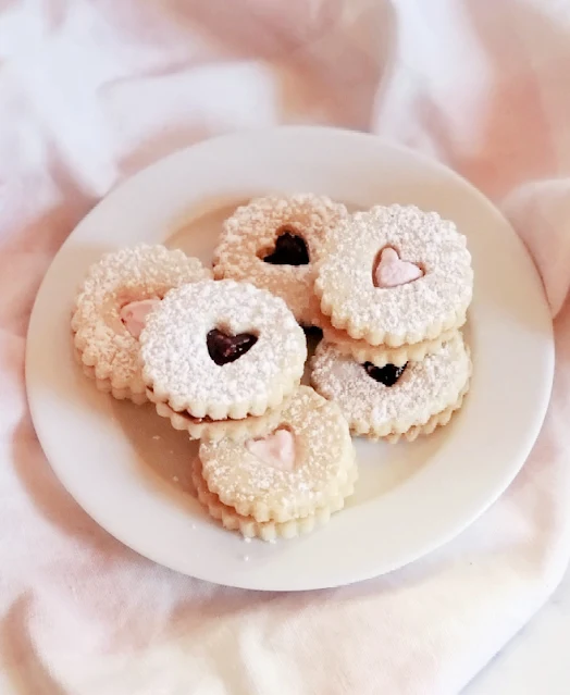 plate of valentine heart linzer cookies