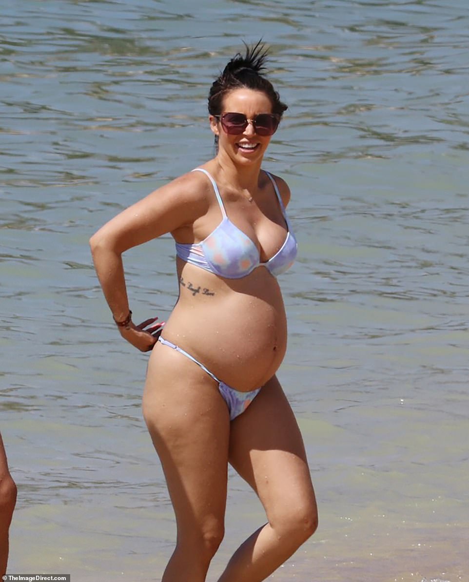 Pregnant Scheana Shay shows off her baby bump in a bikini. 