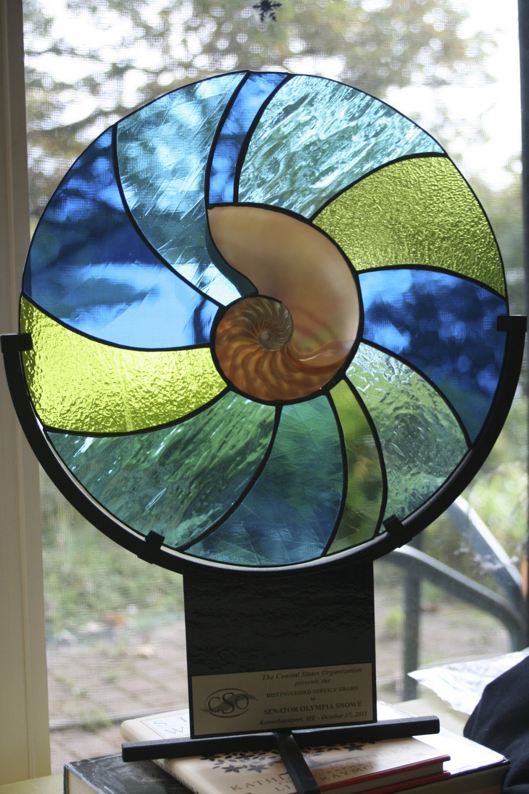 Bonnie Faulkner Stained Glass Nautilus Award for Senator Olympia Snowe