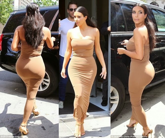 Kim Kardashian Wears Extremely Tight Dress revealing all body curves.