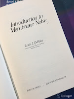 Introduction to Membrane Noise, by Louis DeFelice, superimposed on Intermediate Physics for Medicine and Biology.