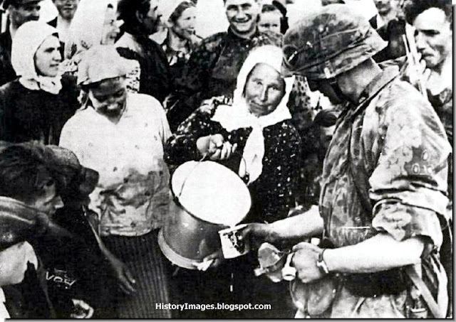  soldier offered milk local  Soviet Union 