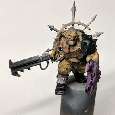 I did end up working on this quite a bit even beyond this stage Ogryn with non metallic elements painted