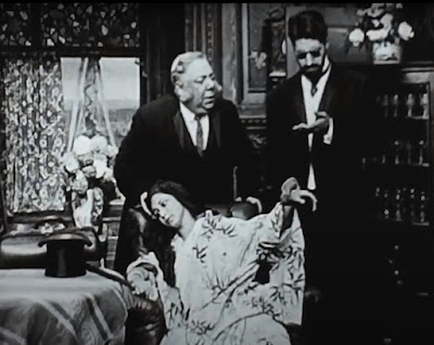A scene from "Doctor Cupid" (1911)