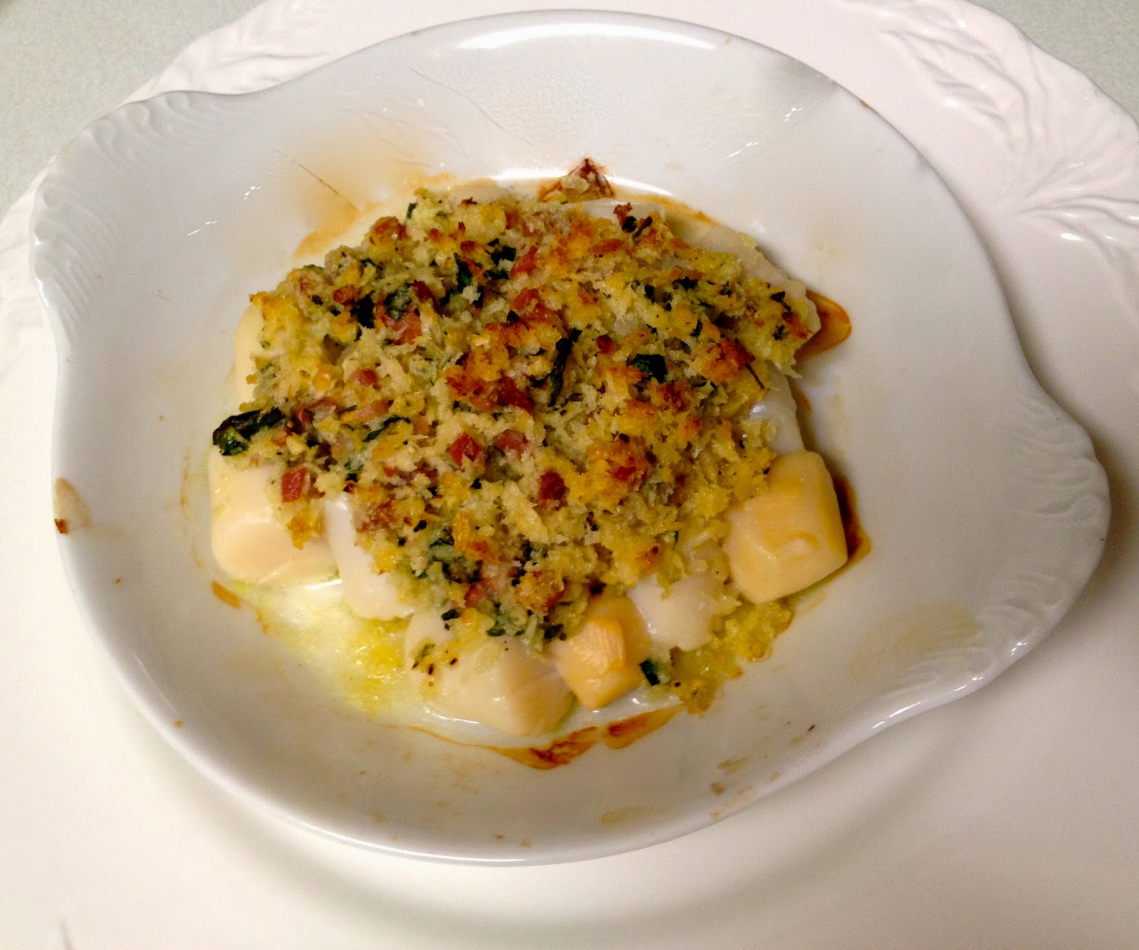 Gratin of Nantucket Bay Scallops and Prosciutto C H E W I N G T H E F A T