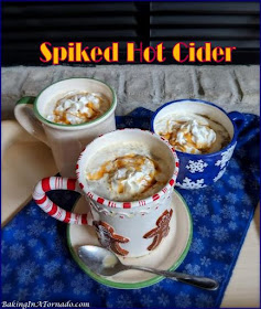 Spiked Hot Cider is a warm comforting drink for a cold day, a party or a holiday gathering. | Recipe developed by www.BakingInATornado.com | #recipe #drink