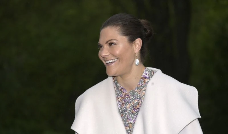 Crown Princess Victoria wore a printed bow dress from by Timo, and ivory annecy jacket from Toteme
