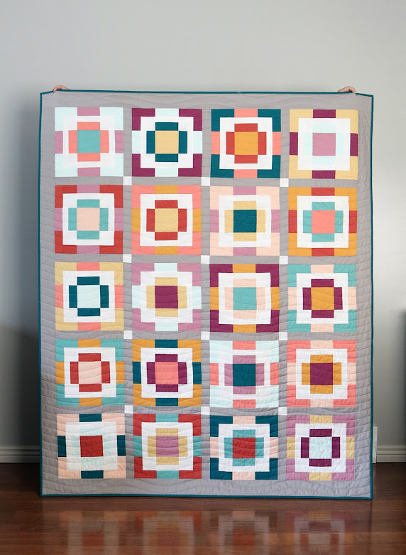 Rise and Shine quilt in Kona cotton solids by Andy of A Bright Corner - pattern from the Playful Precut Quilts book by Amanda Niederhauser