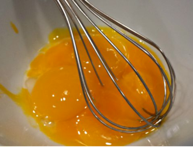 whisking egg yolks