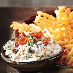 With college and professional football season just days away from its official start, these chip dips are a necessity for hosting a football season kickoff party, or to have nothing between you and your sweet, glorious, high-def TV filled with amazing football games except these delicious, comfort dips. These quick, easy, and delicious chip and dip recipes will complete the tailgate experience you have been imagining since our last glimpse of football in February. 