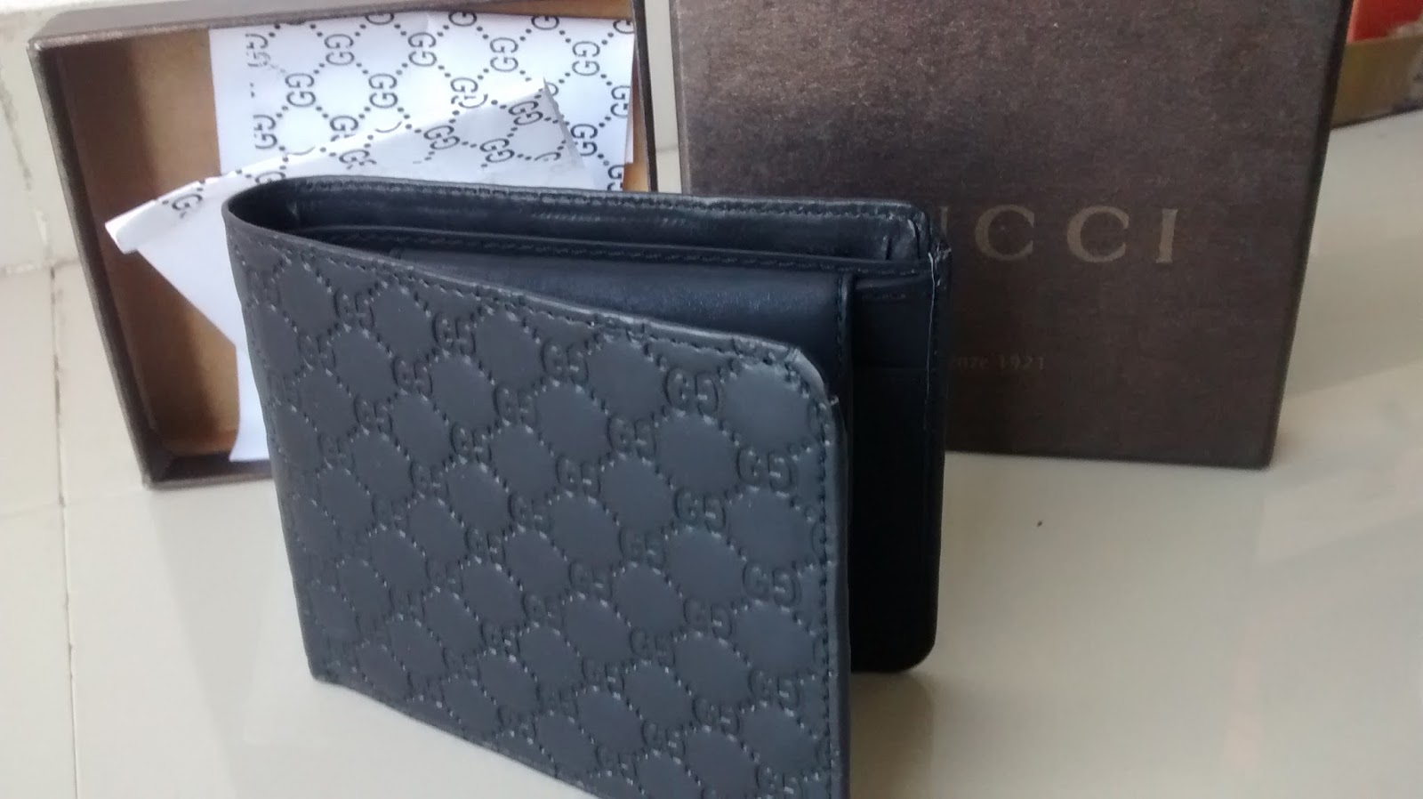gucci leather wallet price