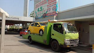 kirim mobil via towing jasa derek gendong mobil