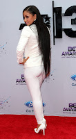 Mya shows off her curves in a white outfit at 2013 BET Awards red carpet