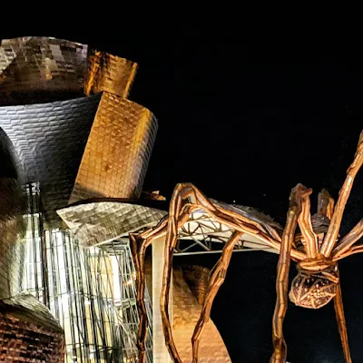 Why Bilbao is the Best Place in Spain for Christmas: Spider sculpture outside the Guggenheim Bilbao at night