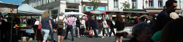 Loches market.  Indre et Loire, France. Photographed by Susan Walter. Tour the Loire Valley with a classic car and a private guide.