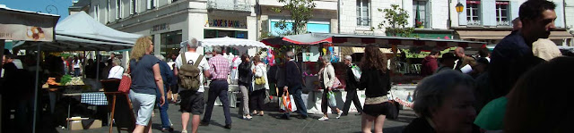 The market in Loches.  Indre et Loire, France. Photographed by Susan Walter. Tour the Loire Valley with a classic car and a private guide.