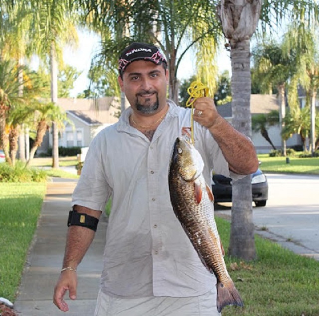 Nemo Lamascolo Fishing in Melbourne Florida for Redfish caught one