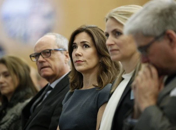 Crown Princess Mary attended the opening of OECD forum at Oecd Conference Centre in Paris. wore Prada dress Gold earrings