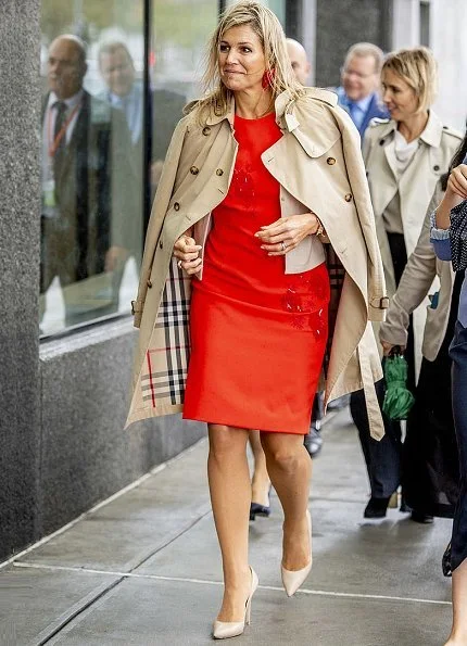 Queen Maxima wore Burberry London trench coat, she wore Natan dress and Gianvito Rossi pumps. Ivanka Trump at a initiative meeting
