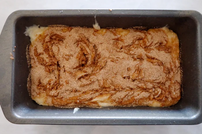 batter in loaf pan ready to bake