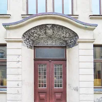 Alesund door with owl motif