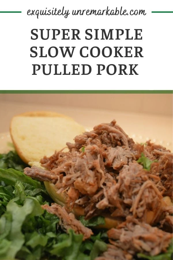 Slow cooker pulled pork sandwich on a bun with lettuce