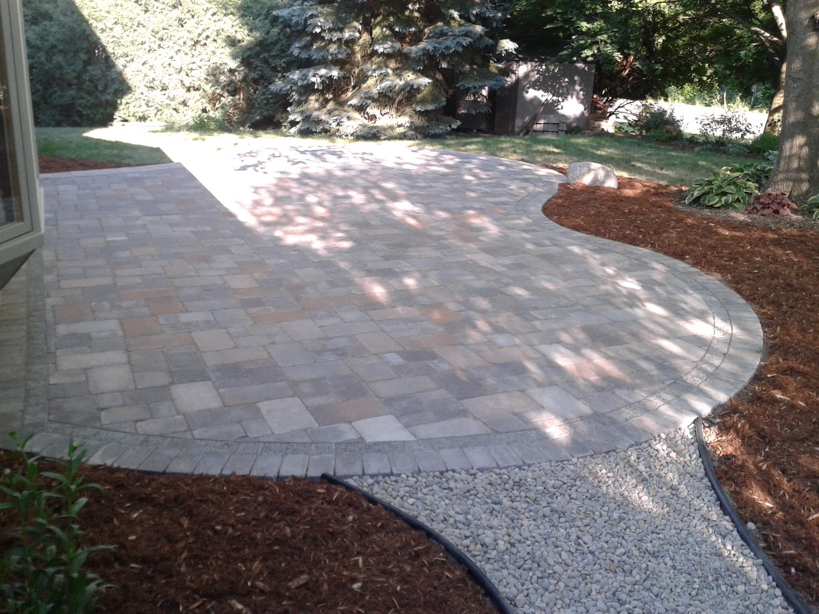 Brick Paver Patio Design, Installation, and Maintenance New Unilock