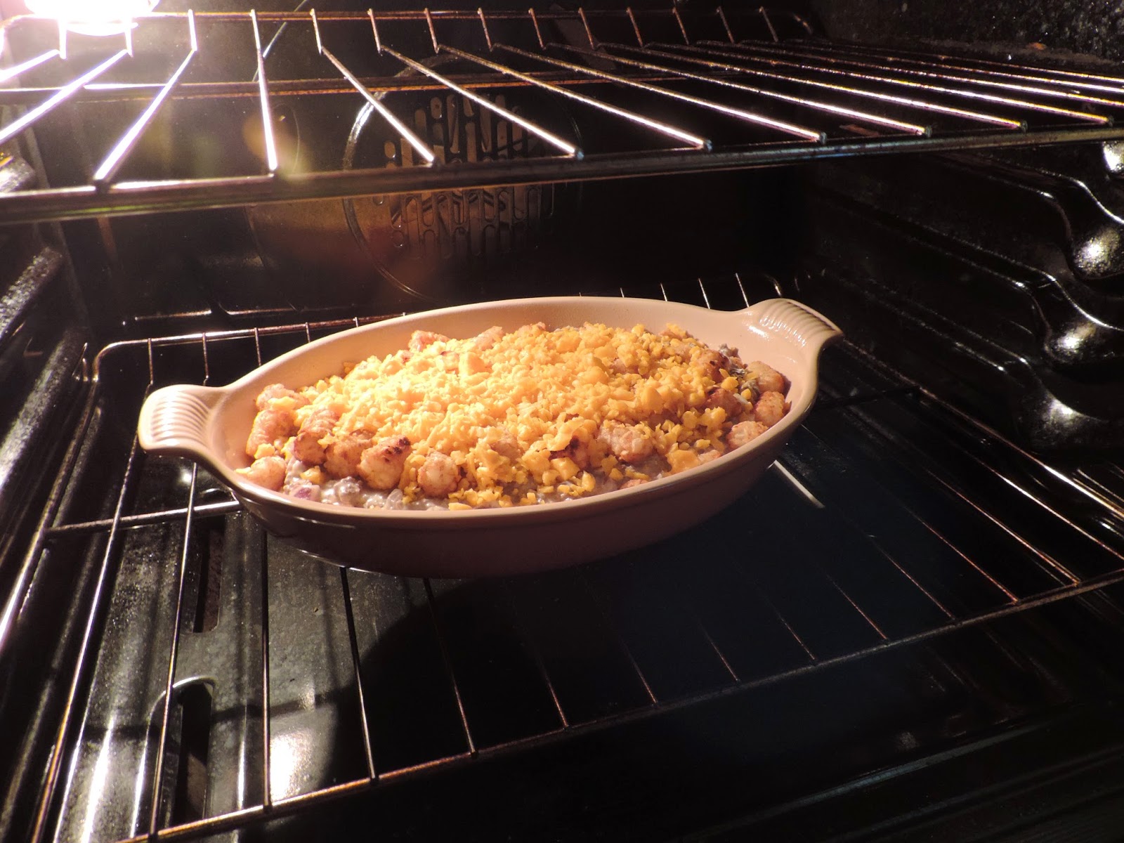The cheese tater tot casserole in the oven.  