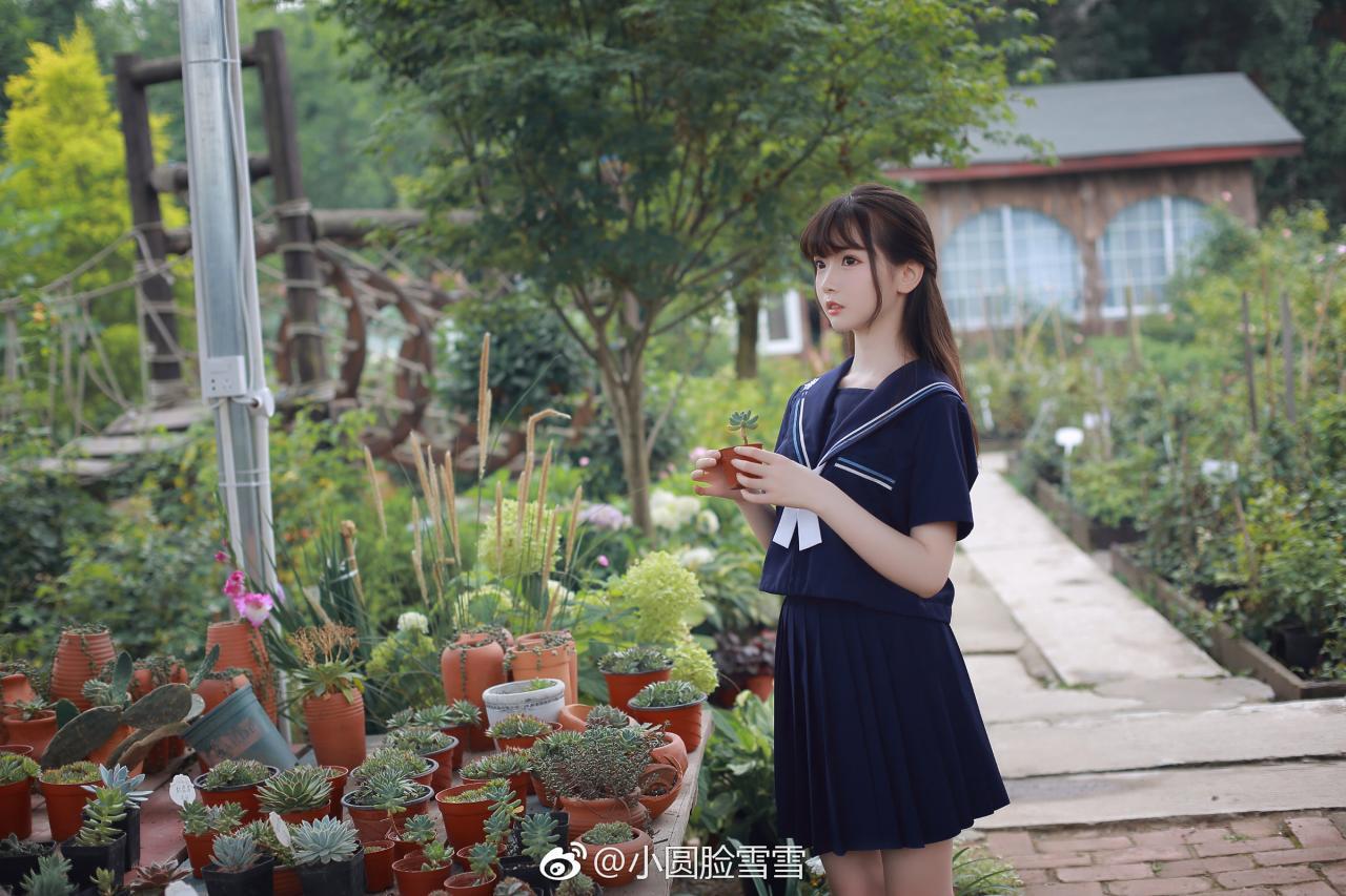 Chinese cute model - Little girl in the flower garden