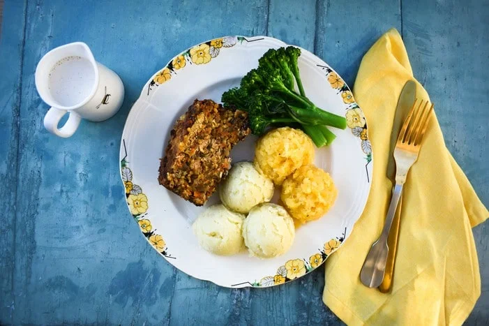 Easy vegan haggis served with tatties, neeps and a creamy whisky sauce