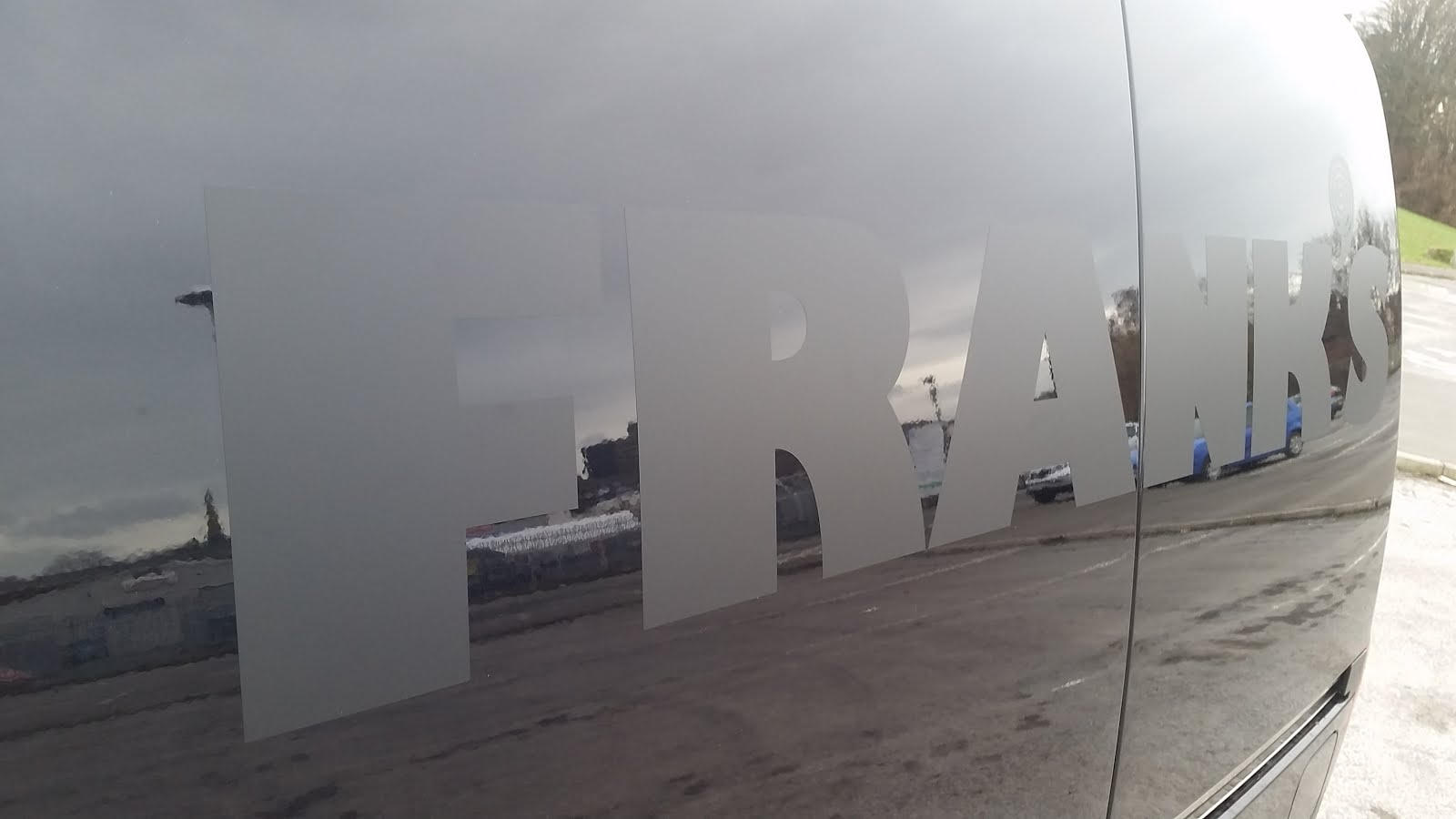 The Green I Signs Blog Subtle matt black graphics on a metallic black