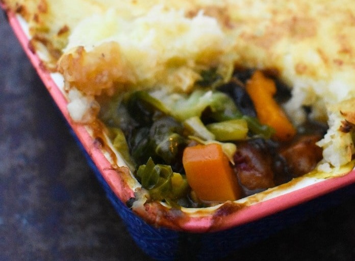 Squash and leek sausage pie in a casserole dish