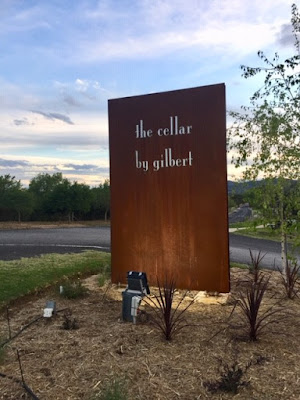 The Cellar by Gilbert sign
