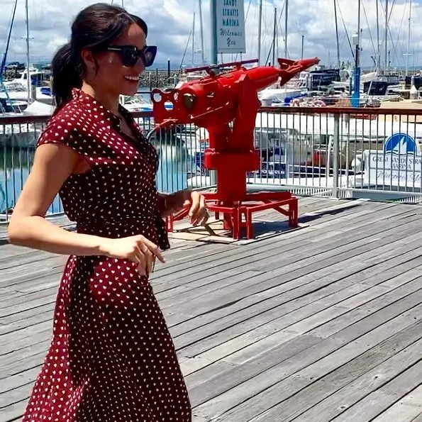 Meghan Markle wore &Other Stories Waist Knot Midi Dress and Sarah Flint Grear Lace Up Sandals. Prince Harry' Australia tour