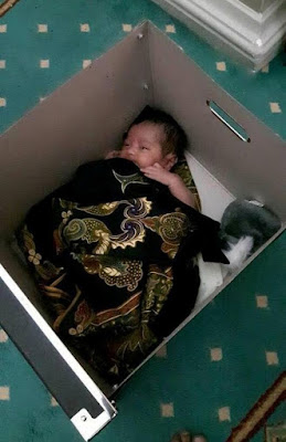 a Photos: Baby found abandoned in a carton with a letter