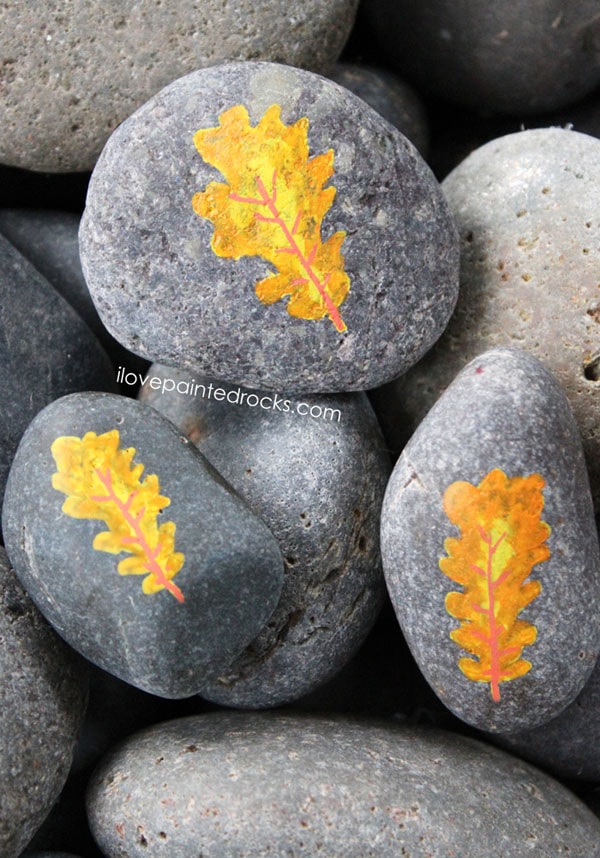 Painted rocks with oak leaves for fall - how to paint leaves onto rocks with Posca pens