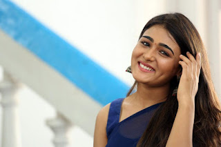 Tamil actress shalini pandey cute smile and slighly laughing in blue saree