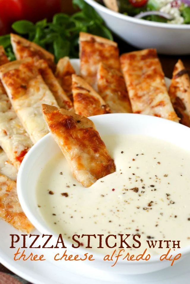 Pizza Sticks with Three Cheese Alfredo Dip | thetwobiteclub.com