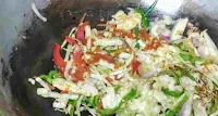 Ading chilly sauce, soya sauce with vegetables for chicken hakka noodles recipe