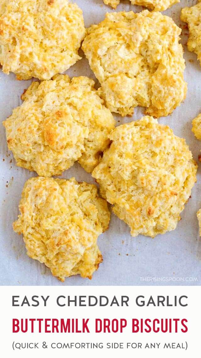 A quick & easy recipe for homemade buttermilk drop biscuits that are slightly crunchy on the outside, tender on the inside, and packed with cheddar cheese + garlic flavor! Bake a batch start to finish in 25 minutes with simple ingredients (no rolling or cutting). Pair them with soup, stew, chili, pot pie, or roasted meats (like chicken, ham, or turkey) for the ultimate comfort food meal!
