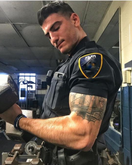 sexy-masculine-alpha-policeman-badge-corrupt-officer-uniform-showing-off-huge-muscle-biceps-tattoo-gym